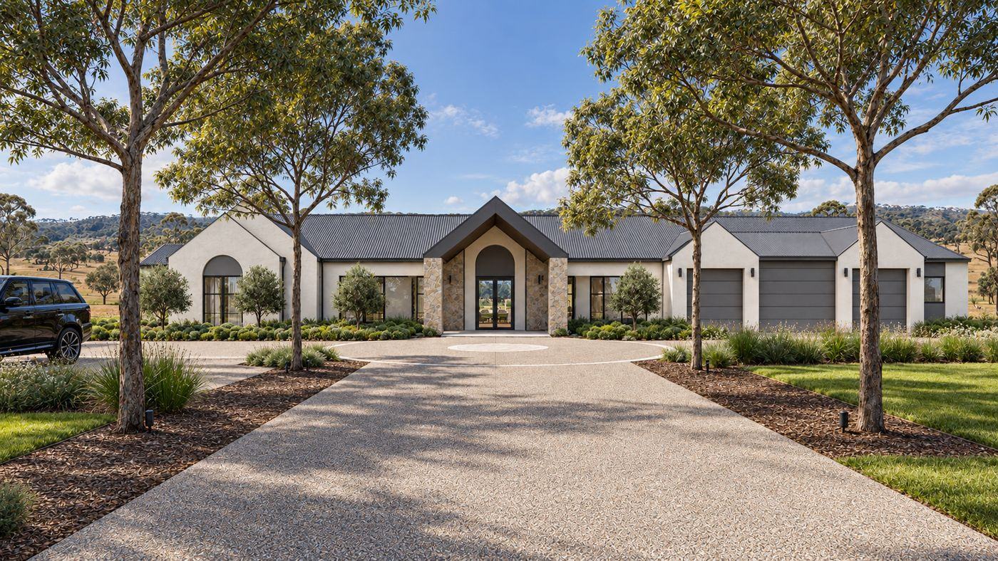 Symmetrical front elevation with stone-clad arched entry, three garages and a tree-lined driveway