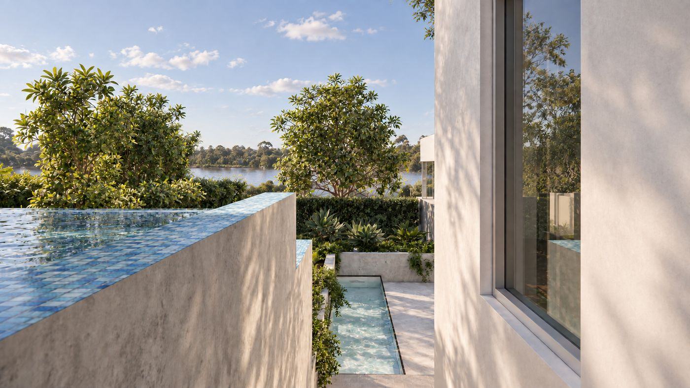 Infinity pool wall beside a narrow water channel and planting, river beyond