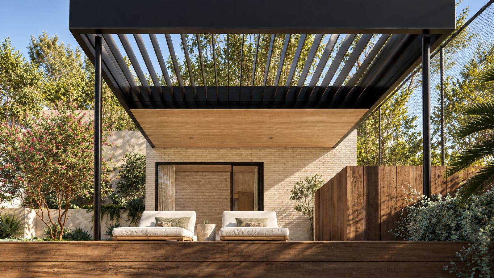 Day beds under a black louvred pergola in front of a pale brick pavilion, York Terrace Residence